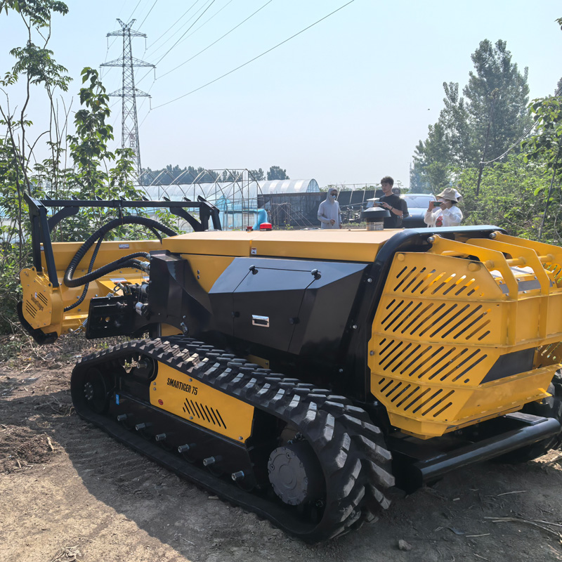 track driven lawn mower