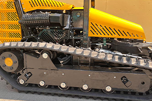 track driven lawn mower